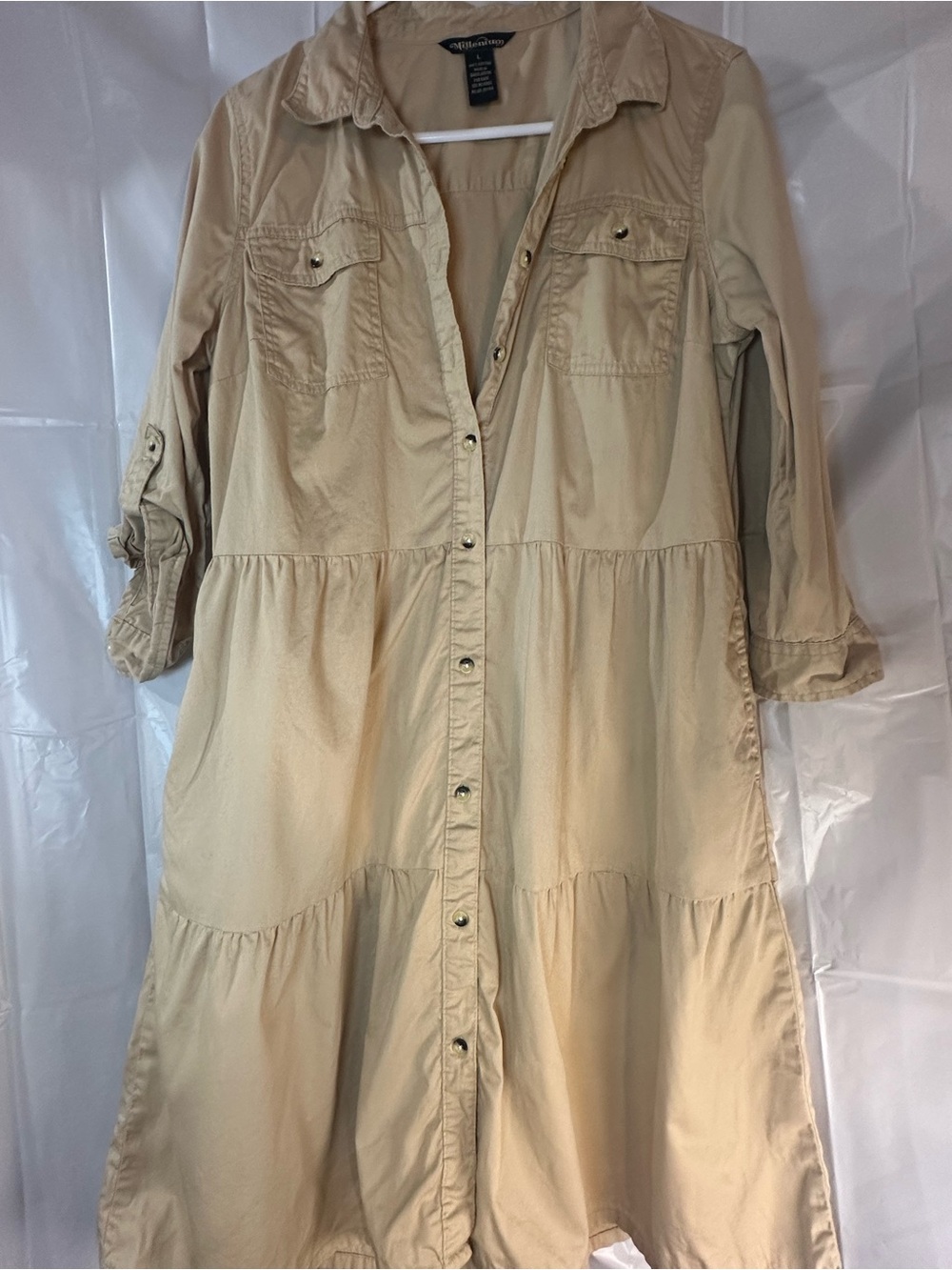 Millenium Women’s Large tan dress shirt with pocket’s